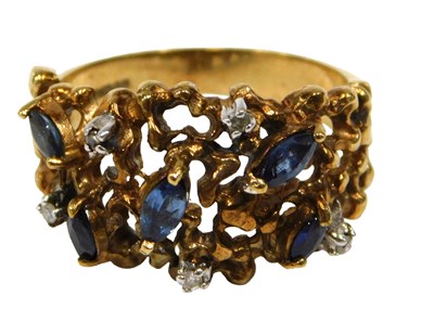 Lot 97 - A 9ct gold abstract style dress ring, of waved...