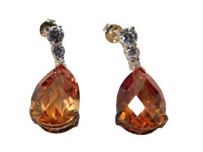 Lot 98 - A pair of silver drop earrings, each with an...