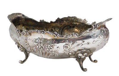 Lot 279 - A 19thC boat shaped dish, repousse decorated...