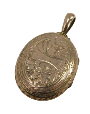 Lot 69 - An early 20thC rolled gold locket, heavily...