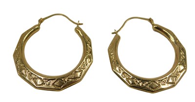 Lot 71 - A pair of hoop earrings, each of hammered...