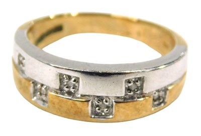 Lot 60 - A 9ct gold bicolour dress ring, in white and...
