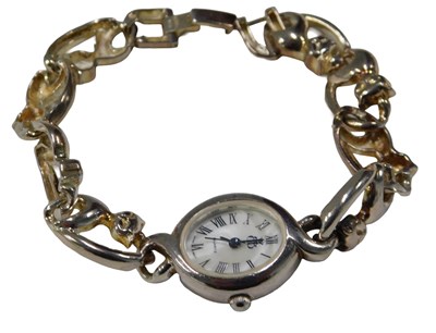 Lot 350 - A Brooks & Bentley silver cat watch, the oval...