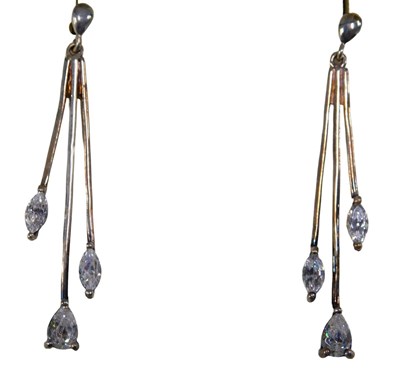 Lot 354 - A pair of silver drop earrings, each of three...