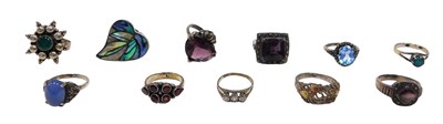 Lot 357 - Eleven silver stone set dress rings, to...