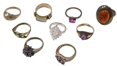 Lot 359 - Eight silver and other dress rings, some...