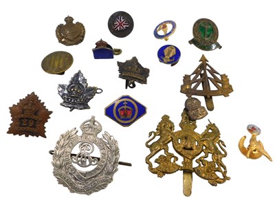 Lot 427 - Various militaria cap badges, to include Air...