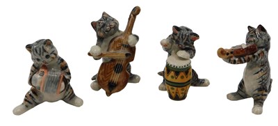 Lot 495 - Four Whimsy style cat figures, playing musical...