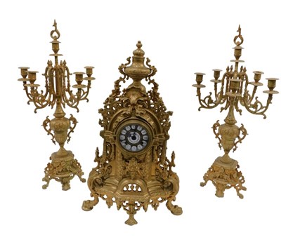 Lot 6 - A 20thC gilt metal clock garniture, the 9cm...