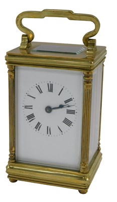 Lot 417 - A 20thC brass carriage clock, with Roman...