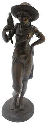 Lot 536 - A 20thC bronze figure of lady in hat holding...