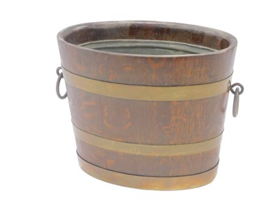 Lot 542 - A late 19thC oak coopered jardiniere or barrel,...