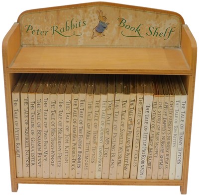 Lot 546 - Potter (Beatrix). Peter Rabbit bookshelf, 25...