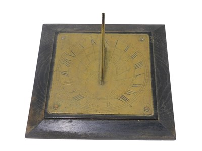 Lot 552 - An early 20thC brass sundial, on oak mount,...