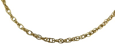 Lot 685 - A fancy link neck chain, yellow metal stamped...