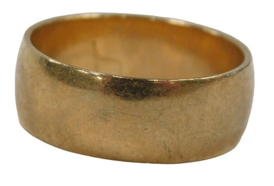 Lot 48 - A 9ct rose gold wedding band, of plain...