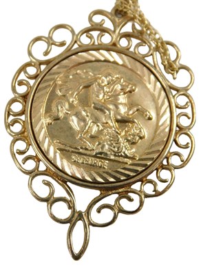Lot 666 - A 9ct gold St George and the Dragon pendant...
