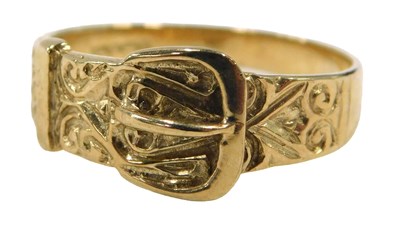 Lot 667 - A 9ct gold buckle ring, bearing import marks,...