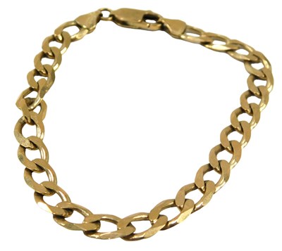 Lot 669 - A flattened curb bracelet, yellow metal...