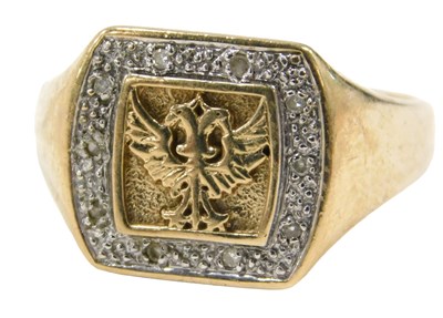 Lot 673 - A 9ct gold dress ring, the square set panel...