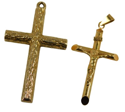 Lot 676 - Two 9ct gold crucifix pendants, comprising one...