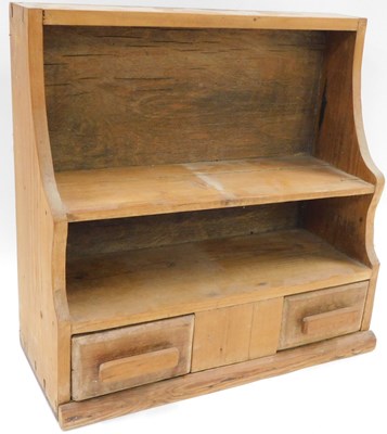 Lot 568 - An early 20thC hanging pine spice rack, with...