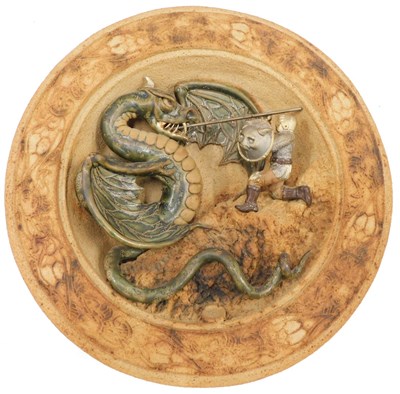 Lot 571 - A Studio pottery wall plaque, figure slaying...