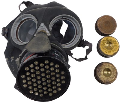Lot 572 - A WWII respiratory gas mask, with metal...