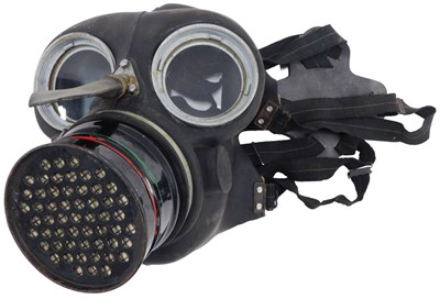 Lot 573 - A WWII respiratory gas mask, with metal...