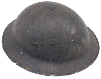 Lot 574 - A 1939 dated British Army helmet, with...