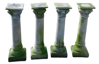 Lot 799 - A set of four composite design stone garden...