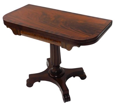 Lot 823 - An early 19thC mahogany fold over card table,...