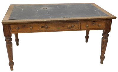 Lot 828 - A 19thC pine kitchen table, with leather...