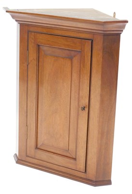 Lot 831 - A George III style mahogany corner...