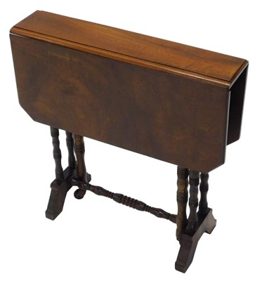 Lot 834 - An Edwardian walnut Sutherland table, of small...