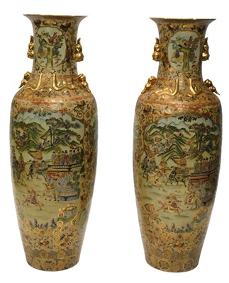 Lot 850 - A pair of Chinese floor-standing pottery vases,...