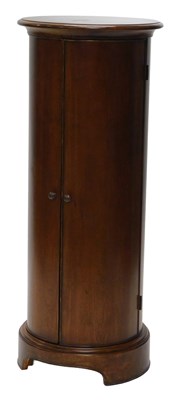 Lot 864 - A circular mahogany finished bathroom cupboard,...