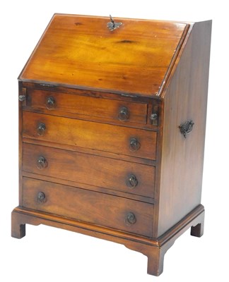 Lot 865 - A late 20thC hardwood bureau, the fall...