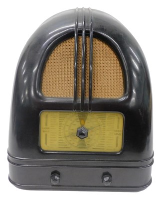 Lot 961 - A mid 20thC Bakelite cased Philco 444 radio,...