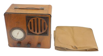 Lot 969 - A mid 20thC walnut cased radio, in outer...