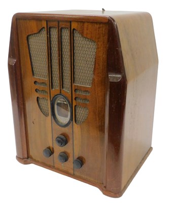 Lot 982 - A mid 20thC walnut case Philco tombstone style...