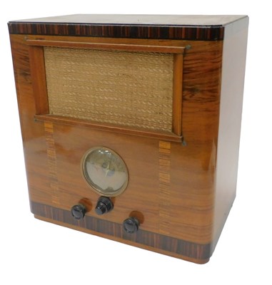 Lot 888 - A mid 20thC walnut cased Alba radio, with Lily...