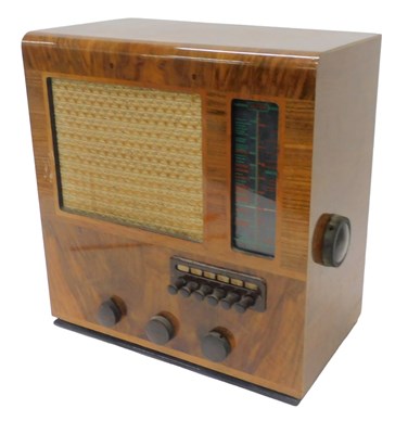 Lot 897 - A mid 20thC walnut cased Ultra 209 radio,...