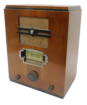 Lot 918 - A mid 20thC walnut cased radio, 54cm high....