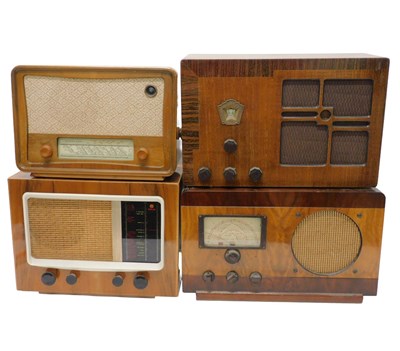 Lot 1027 - Four various mid 20thC walnut cased radios,...