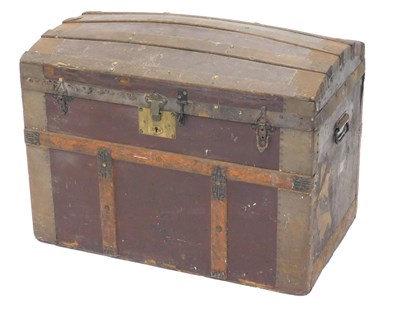 Lot 1057 - A late 19thC domed topped trunk, in pressed...