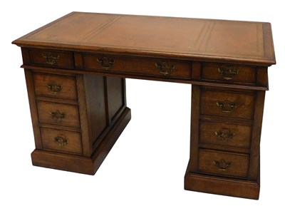 Lot 1062 - A late Victorian oak twin pedestal writing...