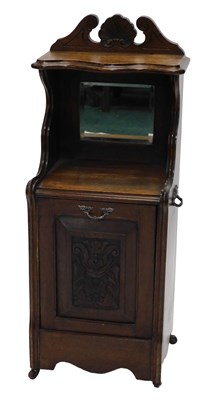 Lot 1070 - A late 19thC oak coal purdonium, with fixed...