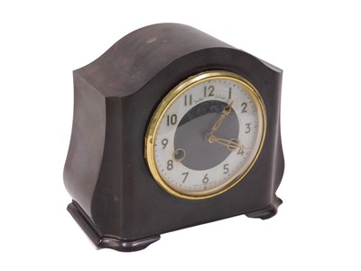 Lot 1089 - A 20thC Bakelite cased Smiths Enfield mantel...