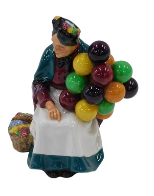 Lot 1109 - A Royal Doulton figure, The Old Balloon Seller,...